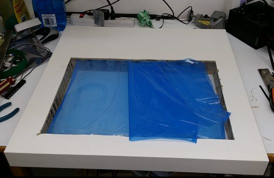 Lack table with observation hole