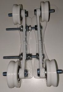 I cut the filament holder in half so it could print on a small bed.